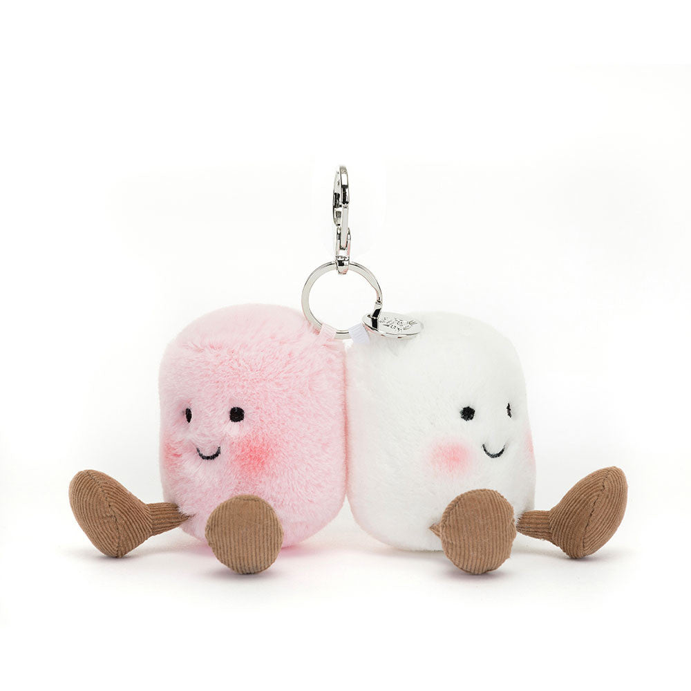 Clip keychain with a pair of marshmallows - one pink and one white. Both have smiley faces and feet.