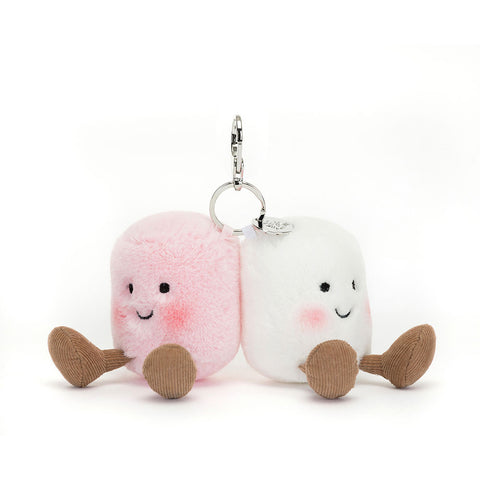 Clip keychain with a pair of marshmallows - one pink and one white. Both have smiley faces and feet.