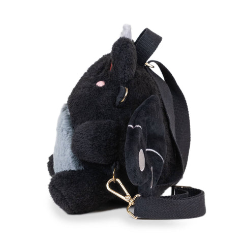 Image shows a side view of the stuffed mothman-frog backpack