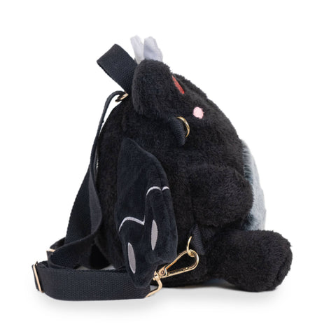Image shows another side view of the stuffed mothman-frog backpack