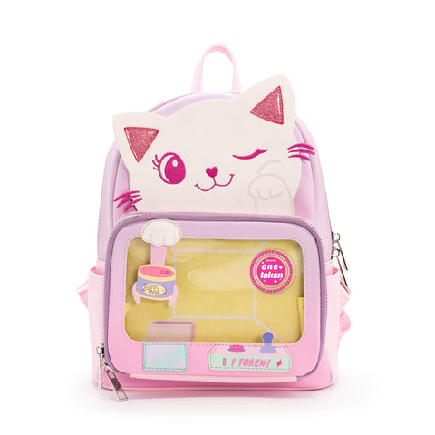 Image shows a faux leather backpack with a winking kitty. The lower portion has a zipper with a yellow card.
