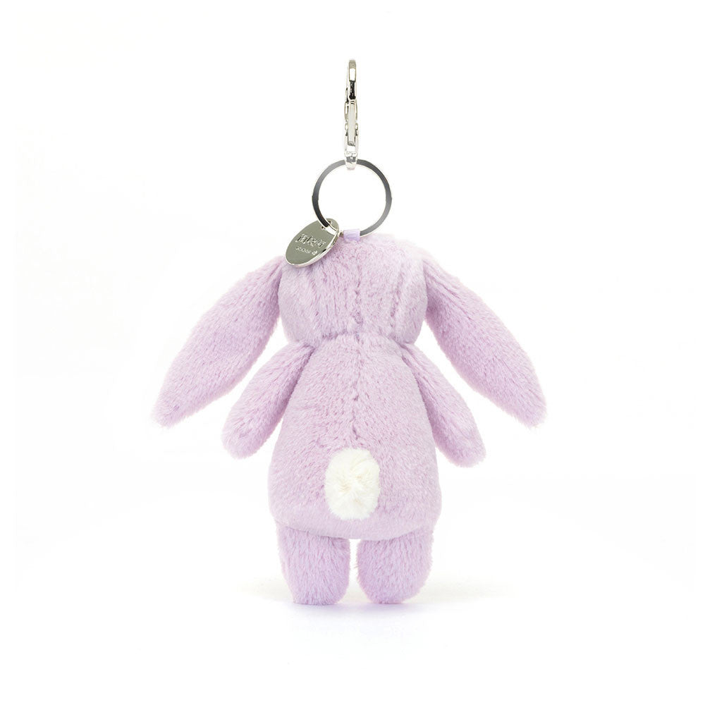 Back view of lavender colored stuffed bunny hanging from clip keychain