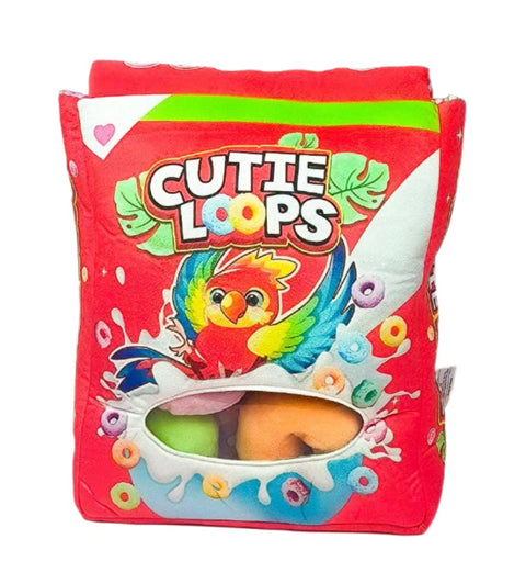 Image shows a stuffed cereal box with a rainbow bird and the title "Cutie Loops".