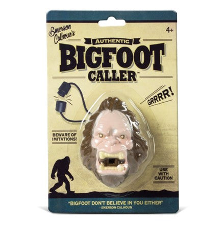 Image shows the bigfoot caller inside its package. The caller is in the shape of Bigfoot's head.