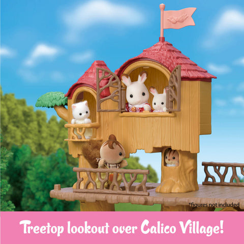 Toy treetop lookout with animals on a clear blue sky background