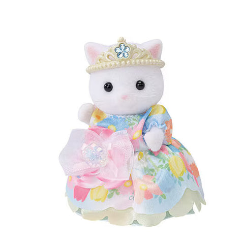Toy cat in a princess outfit with a floral dress and tiara on a white background