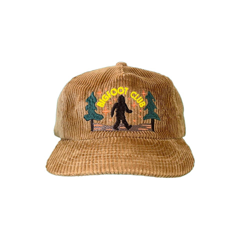 Brown corduroy cap with Bigfoot Club design on a white background