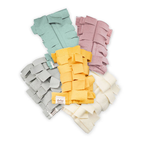 An image showing fleece duster heads in various pastel colors