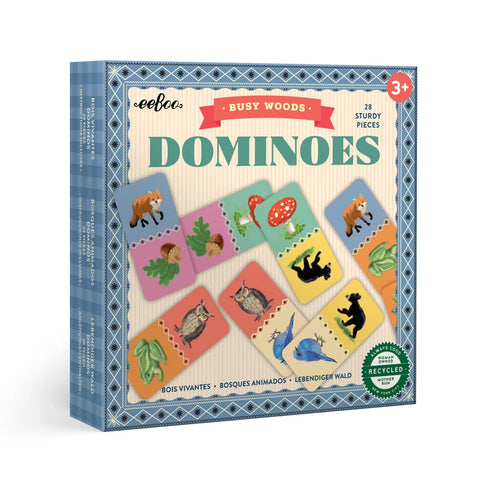 Image shows the game box for Busy Woods Dominoes. Sample dominoes have woodland animals, plants, and mushrooms.