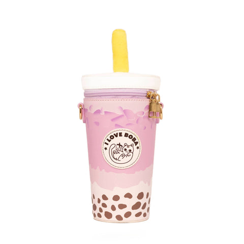 Image shows a faux leather handbag in the style of a taro boba milk tea. The lid zips open.