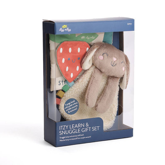 Image shows a bunny lovey and a fabric book inside packaging