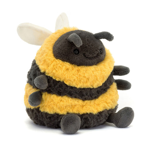 Image shows a seated chubby stuffed bumblebee