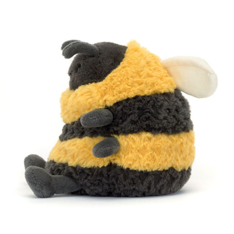 Image shows a side view of the chubby stuffed bumblebee