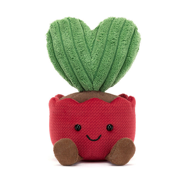 Image shows a stuffed heart-shaped cactus in a red pot. The pot has a smiley face and feet.