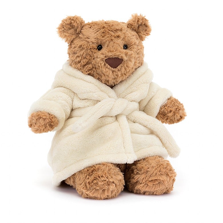 The same brown teddy bear in a bathrobe with the hood down