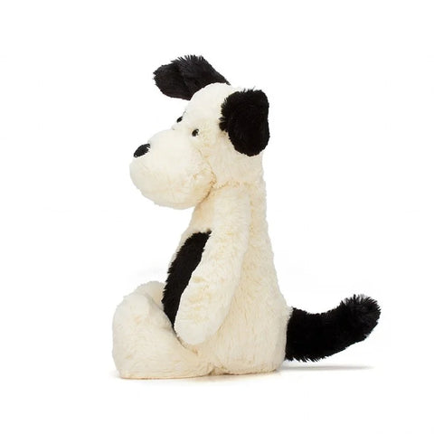 A side view of the same stuffed puppy