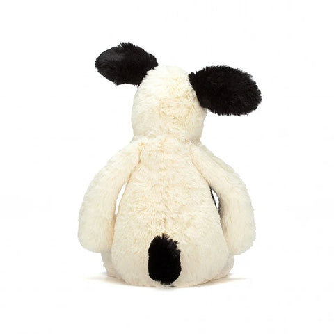 A back view of the stuffed puppy