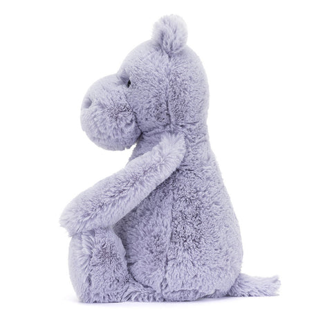 Image shows a side view of the lavender stuffed hippo