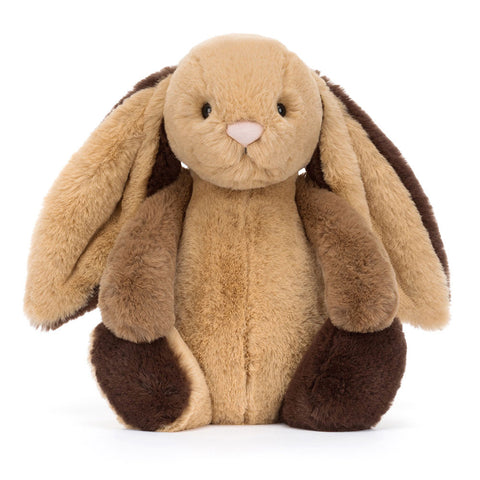 Image shows a front view of the stuffed patchwork bunny