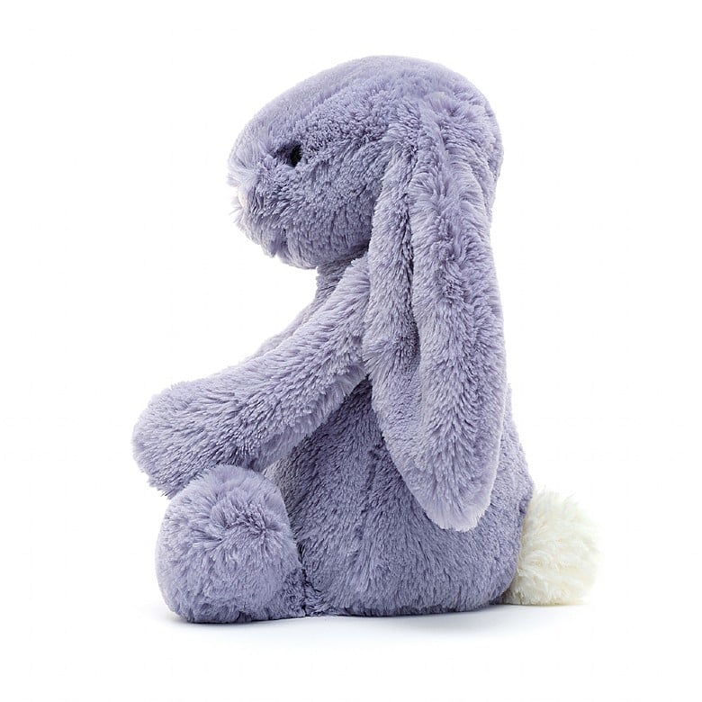 A side view of the same stuffed bunny