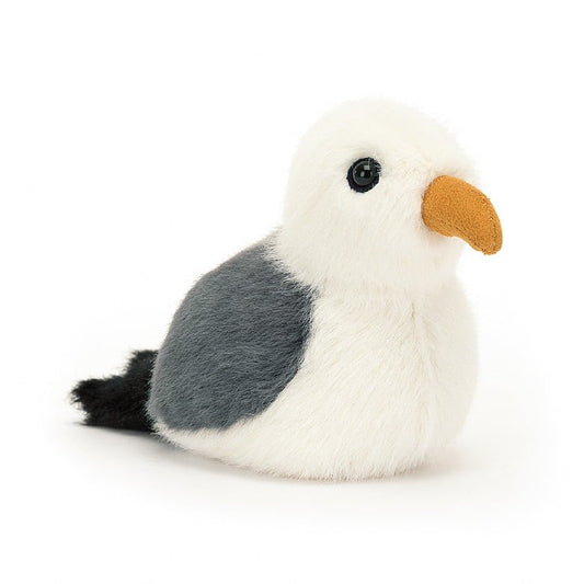 A small seagull stuffed animal