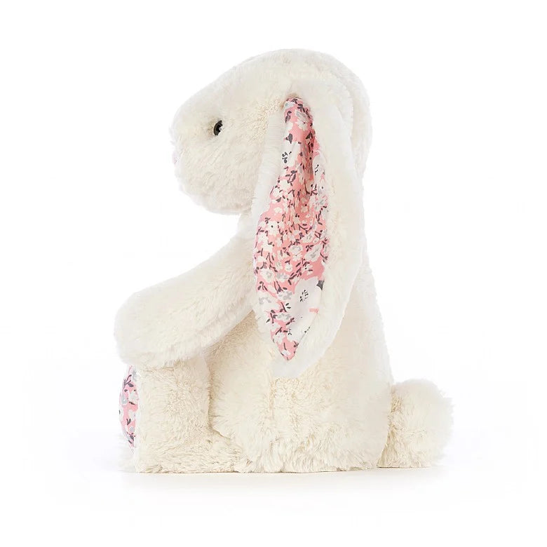 A side view of the same stuffed bunny