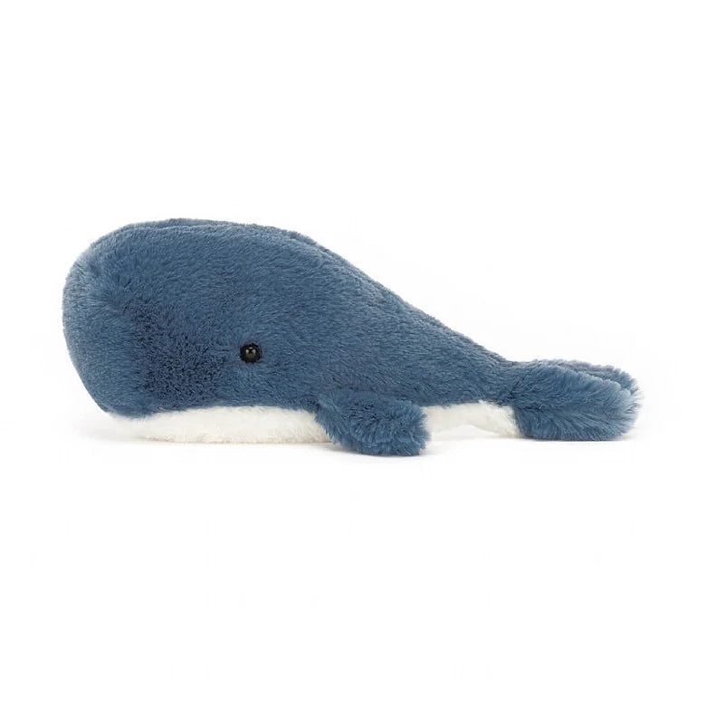 A side view of the same stuffed whale