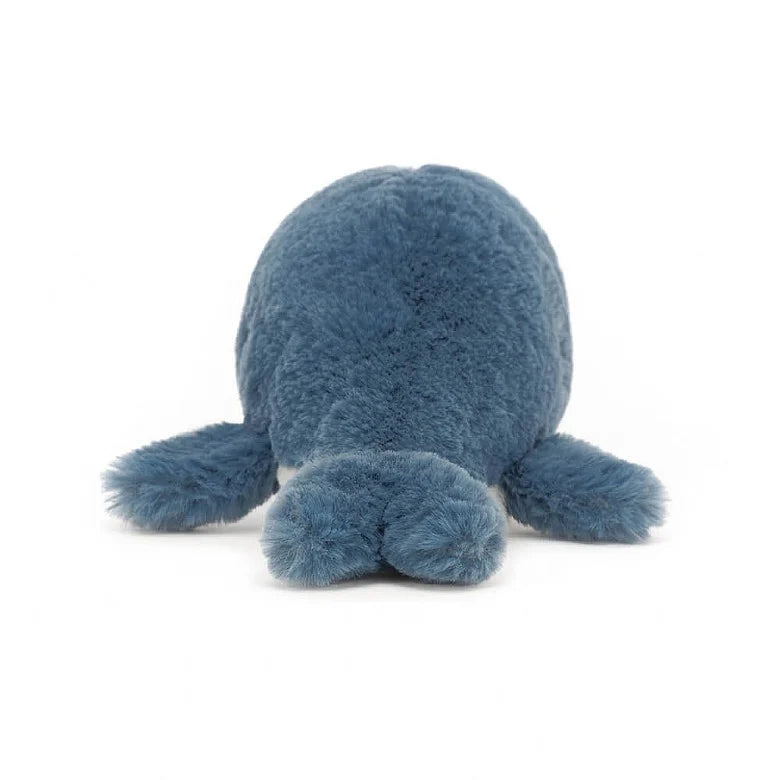 A back view of the same stuffed whale