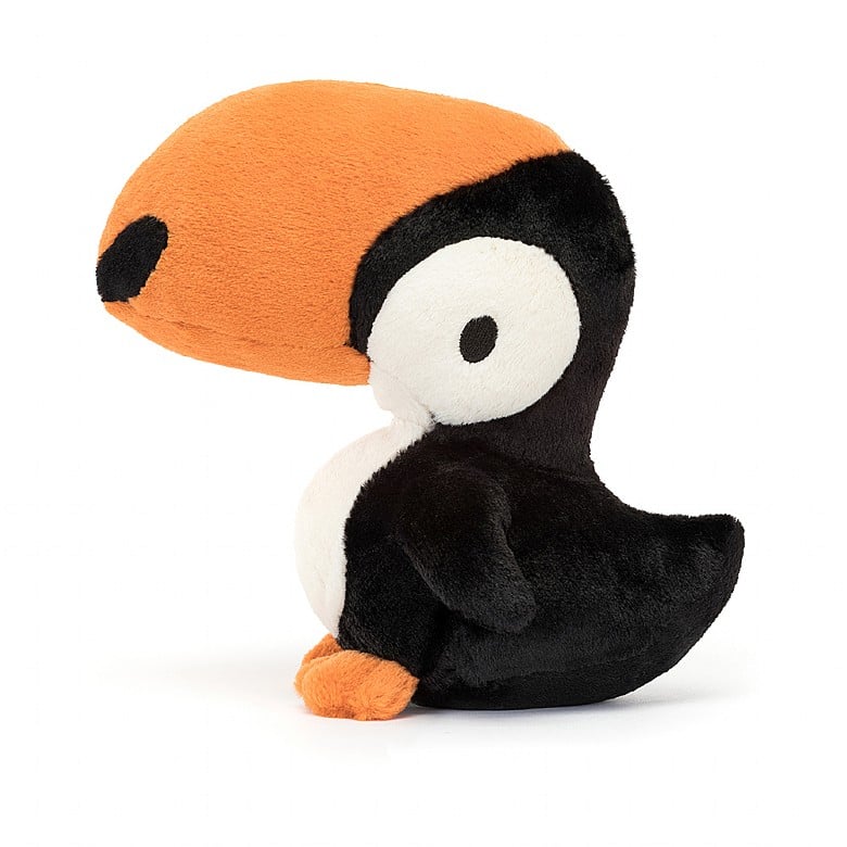 A side view of the same stuffed toucan