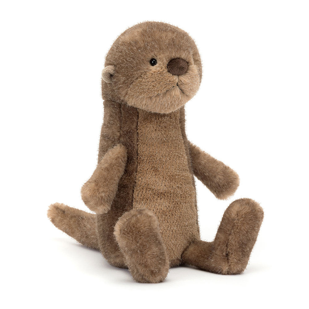 A seated, stuffed River Otter