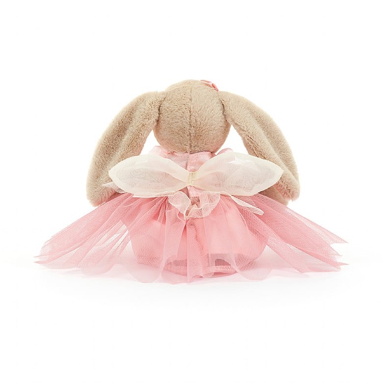 A back view of the stuffed bunny, showing her fairy wings