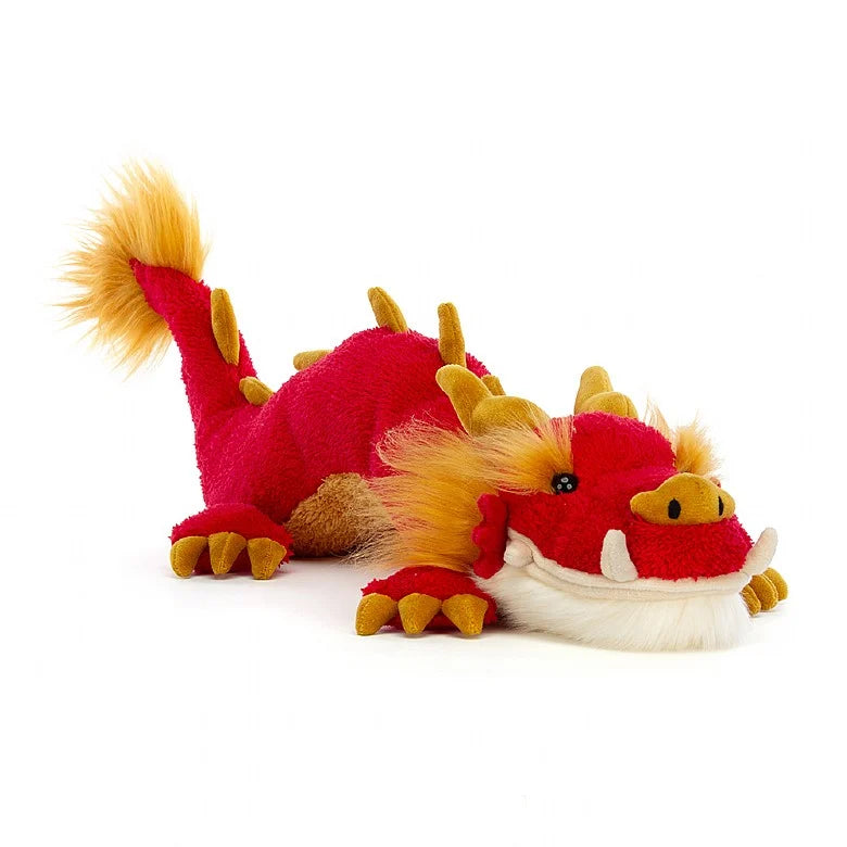 A red and gold stuffed dragon designed similar to the dragons seen in Chinese parades and festivals