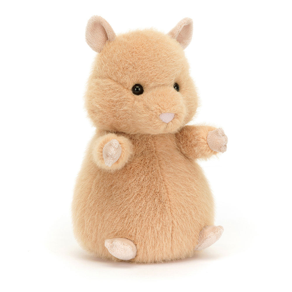 A small, seated tan hamster stuffy