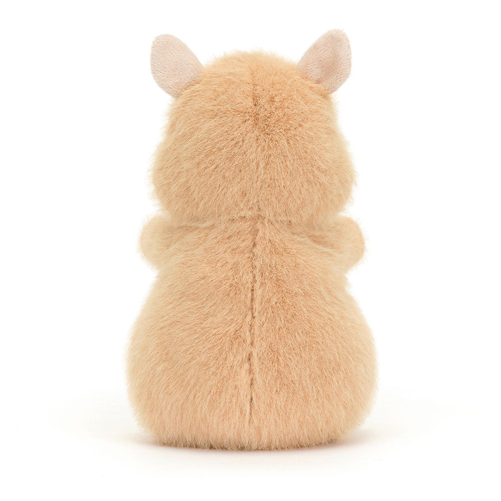 A back view of the stuffed hamster