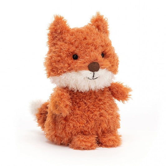 A scruffy looking stuffed fox