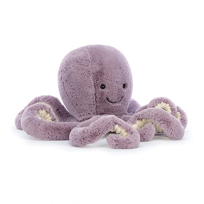 A large, light purple stuffed octopus with curly tentacles