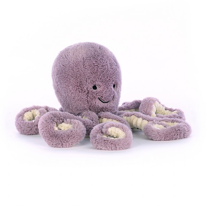 A small stuffed octopus with light purple fur