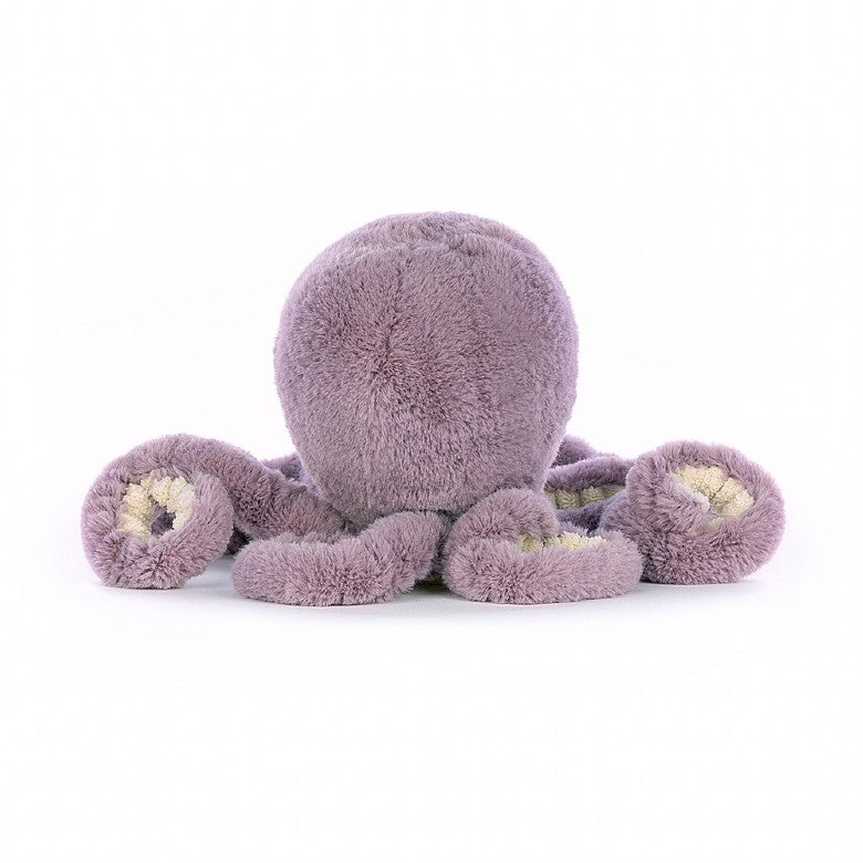 A back view of the stuffed purple octopus