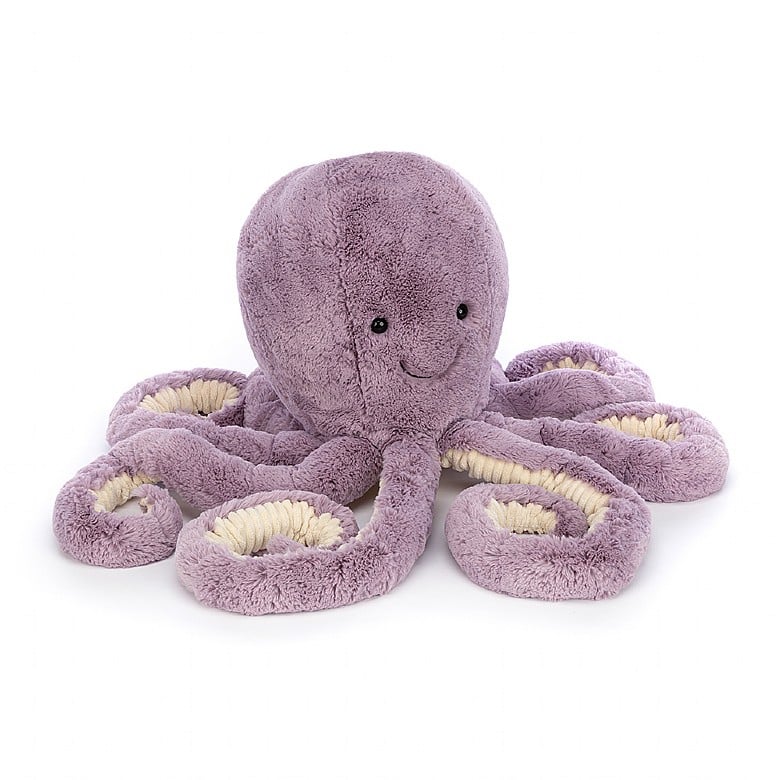 An extra large stuffed octopus with light purple fur and curly tentacles