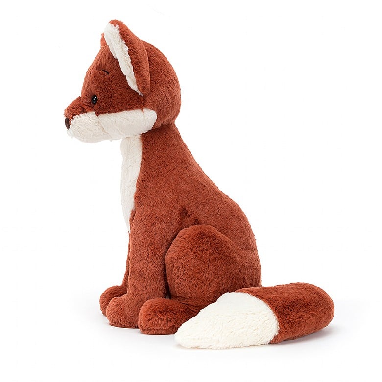 A side view of the tall stuffed fox