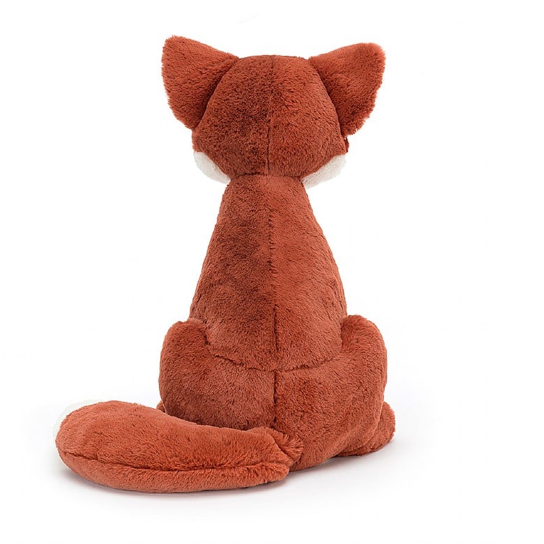 A back view of the tall stuffed fox