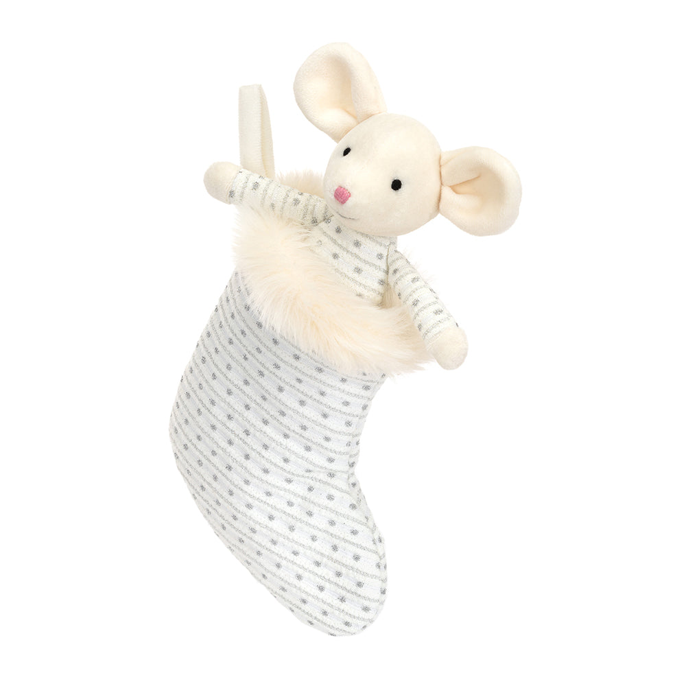 A stuffed mouse sitting inside a stocking. The mouse is wearing white and light blue sparkly pajamas that match the stocking.