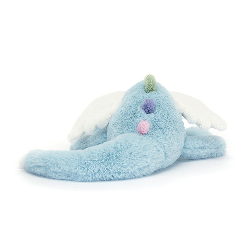 A back view of the light blue stuffed dragon