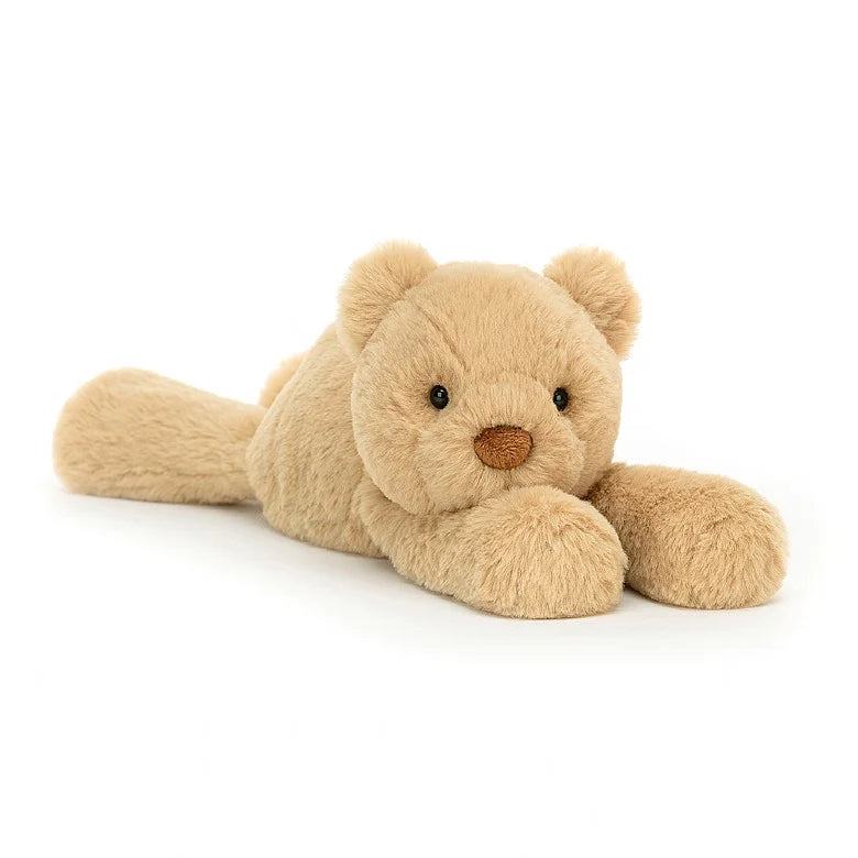 A floppy, tan-colored teddy bear