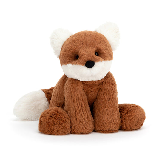 A floppy, soft-looking stuffed fox