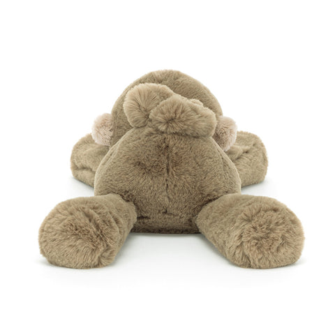 Image shows a back view of the stuffed monkey