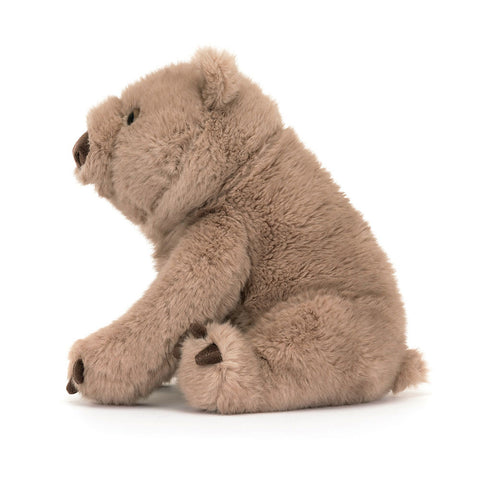 Image shows a side view of the stuffed wombat