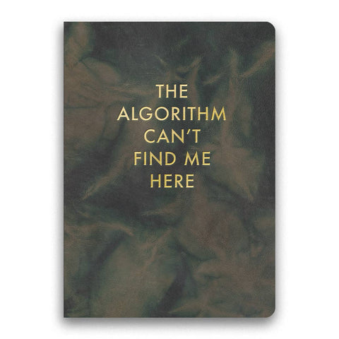 Image shows a black & grey journal with text that reads "The algorithm can't find me here"