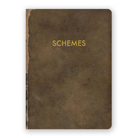 Image shows a brown journal. Cover text reads "Schemes" in gold.