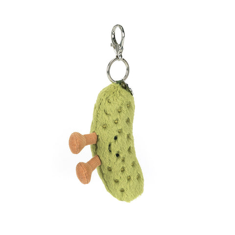 Plush pickle with happy face and feet attached to a silver clip keychain